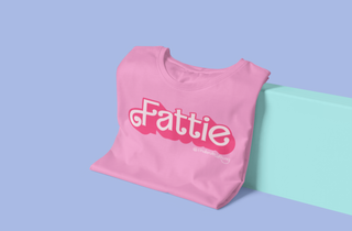 A pink tshirt that reads Fattie in a font similar to Barbie